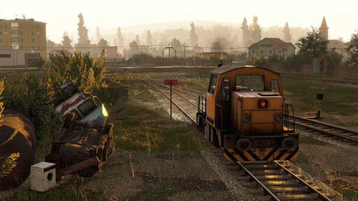 Derail Valley Simulator Screenshot Train City DE2 Morning Fog Rust Boat